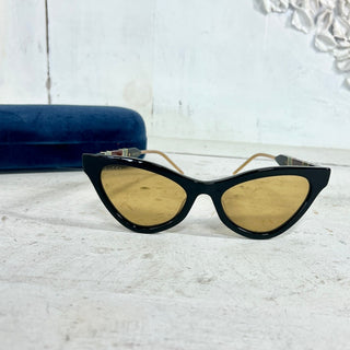 Gucci GG0597S Black Acetate Yellow Lens Cat Eye Sunglasses