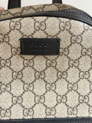 Gucci supreme canvas backpack
