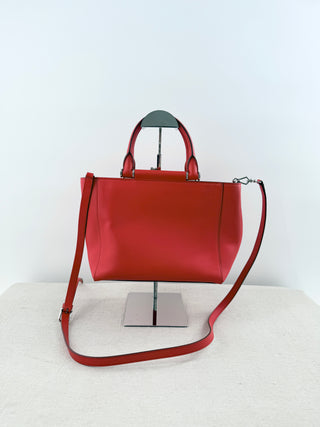Max Mara structured leather tote bag featuring dual top handles, and detachable shoulder strap