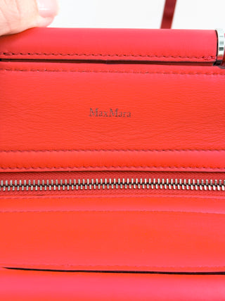 Max Mara structured leather tote bag featuring dual top handles, and detachable shoulder strap