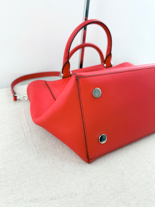 Max Mara structured leather tote bag featuring dual top handles, and detachable shoulder strap