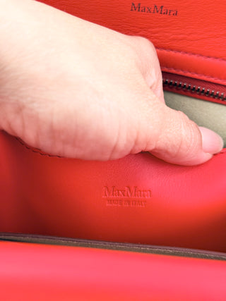 Max Mara structured leather tote bag featuring dual top handles, and detachable shoulder strap