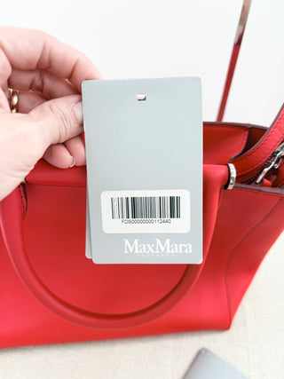Max Mara structured leather tote bag featuring dual top handles, and detachable shoulder strap