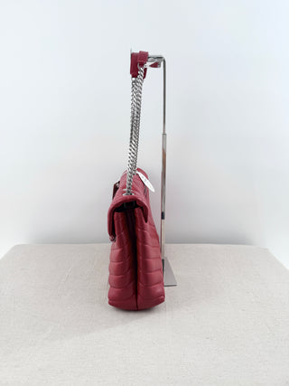 YSL Lolou shoulder bag crafted in quilted lambskin leather with signature stitching and YSL hardware, finished with sliding chain-and-leather shoulder straps