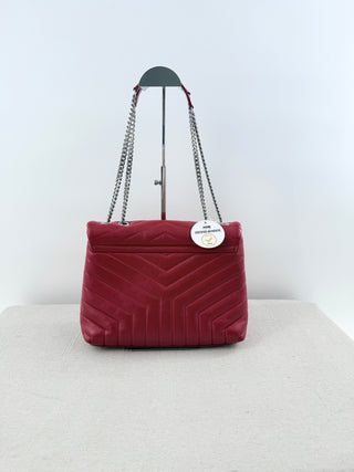 YSL Lolou shoulder bag crafted in quilted lambskin leather with signature stitching and YSL hardware, finished with sliding chain-and-leather shoulder straps