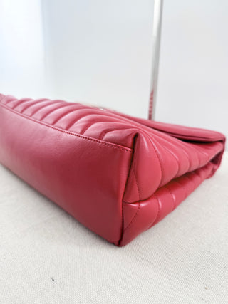 YSL Lolou shoulder bag crafted in quilted lambskin leather with signature stitching and YSL hardware, finished with sliding chain-and-leather shoulder straps