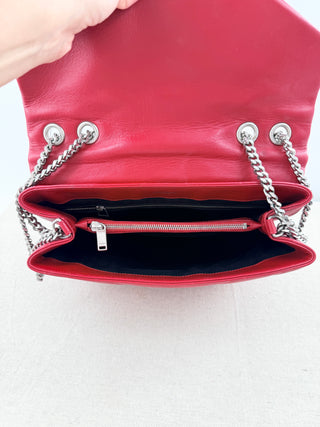 YSL Lolou shoulder bag crafted in quilted lambskin leather with signature stitching and YSL hardware, finished with sliding chain-and-leather shoulder straps