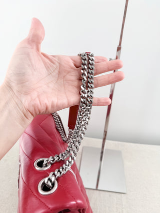 YSL Lolou shoulder bag crafted in quilted lambskin leather with signature stitching and YSL hardware, finished with sliding chain-and-leather shoulder straps