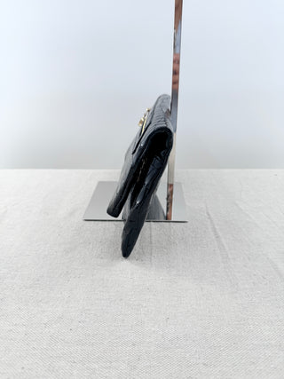 Alas leather patent textured clutch bag