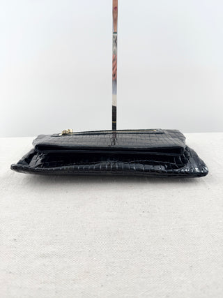 Alas leather patent textured clutch bag