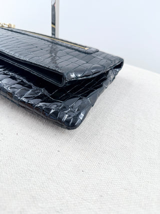 Alas leather patent textured clutch bag