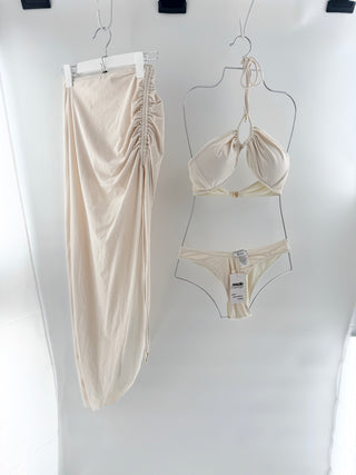 la sirene bikini set featuring halter-style triangle silhouette with gathered detailing at the bust and matching low-rise bikini bottom and matching midi skirt with an adjustable drawstring affect across the front, S