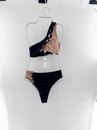 Camila Coelho modern, color-block two-piece featuring an asymmetrical, one-shoulder style with a bold cutout detail across the front and the bottoms are high-cut with a slightly cheeky silhouette, S/M
