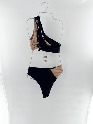 Camila Coelho modern, color-block two-piece featuring an asymmetrical, one-shoulder style with a bold cutout detail across the front and the bottoms are high-cut with a slightly cheeky silhouette, S/M