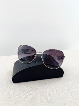 Prada sunglasses metal with triangle on temples