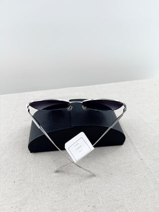 Prada sunglasses metal with triangle on temples