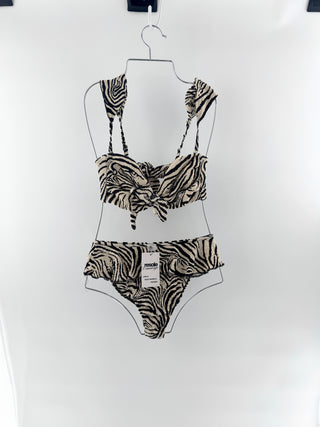 Montce bold, feminine, crinkled, ribbed fabric bikini, top features a bandeau style with thick shoulder straps and dramatic center knot detail and bottoms are high-waisted with a flattering high-cut leg and a flirty ruffle trim along the waistband, top S