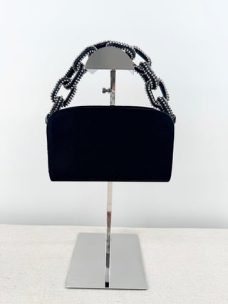 serena uziyel satin clutch featuring statement crystal-beaded top handle with chain-link inspired detailing