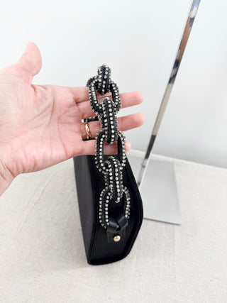 serena uziyel satin clutch featuring statement crystal-beaded top handle with chain-link inspired detailing