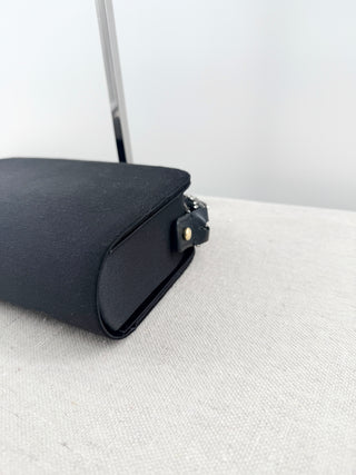 serena uziyel satin clutch featuring statement crystal-beaded top handle with chain-link inspired detailing