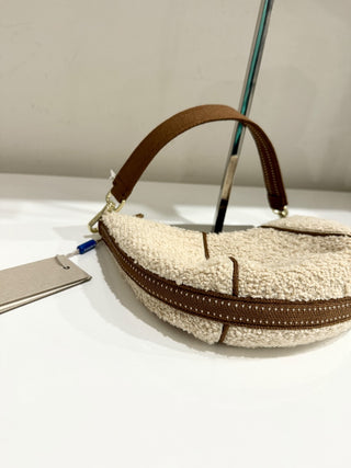 Rothy's small crescent teddy bag