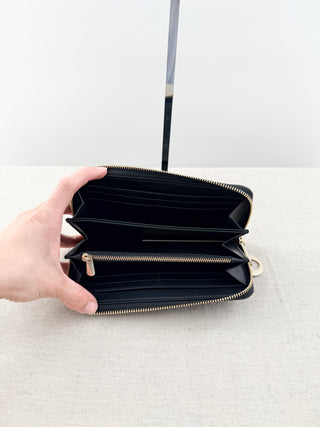 Dior voyageor wallet leather cannage