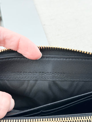Dior voyageor wallet leather cannage