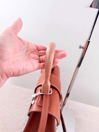 Goyard goyardine saigon top handle bag