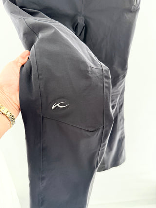 kjus formula ski pants featuring regular fit and mid-rise in sleek technical stretch fabric, designed with waterproof zip pockets, S
