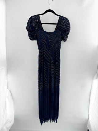 Azulu sheer chevron printed maxi dress featuring dramatic puff sleeve, front knot detail, and statement fringe hem, S