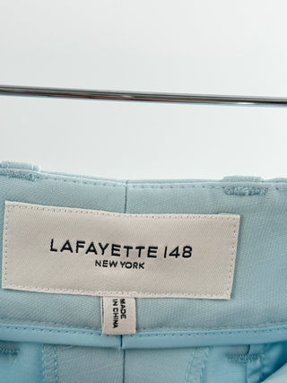 Lafayette 148 tailored pantsuit set featuring single-button blazer with sharp notch lapels, paired with coordinating high-rise tailored trousers in lightweight crepe fabric, 2
