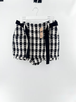 Maje tweed skort featuring textured houndstooth-inspired weave, contrast ribbon waistband detailing, and tailored pleated style with built-in shorts, 40