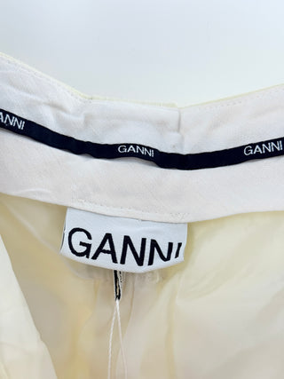 Ganni pastel tailored trousers featuring high-rise waist, front pleat detailing, and cuffed cropped hem in woven fabric, 32