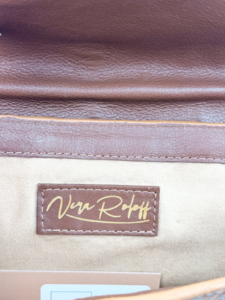 Vera Roloff textured leather clutch bag with wristlet chain