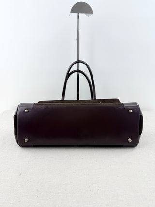 Verafied top handle suede and leather bag with long strap