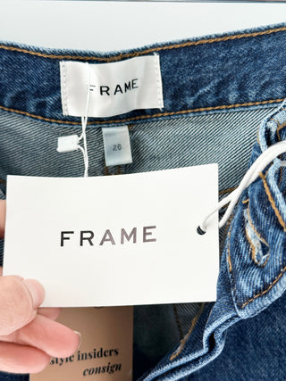 Frame THE DARE SHORT featuring a mid-rise waist, classic five-pocket styling, and distressed detailing, finished with a frayed raw hem, 26