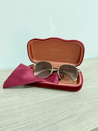 Gucci GG 1142S Gold frame, brown lens sunglasses