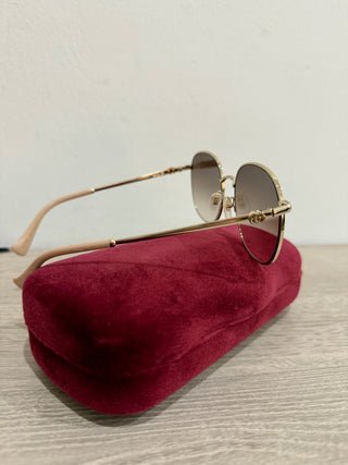 Gucci GG 1142S Gold frame, brown lens sunglasses