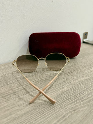 Gucci GG 1142S Gold frame, brown lens sunglasses