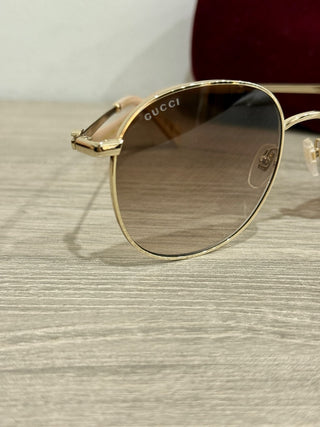 Gucci GG 1142S Gold frame, brown lens sunglasses
