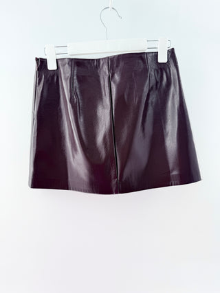 Joe's faux leather mini skirt featuring a smooth high-rise waistband and a sleek straight silhouette, finished with a glossy-patent style, 2