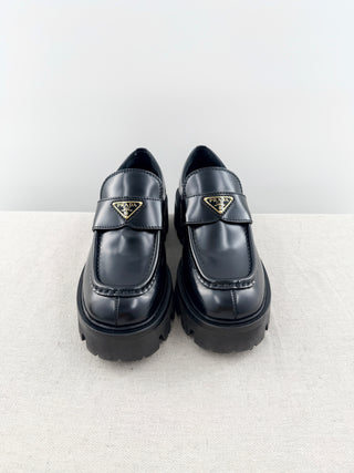 Prada brushed leather monolith loafers with chunky lug sole, 35.5