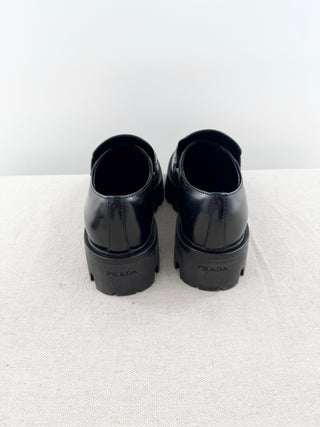 Prada brushed leather monolith loafers with chunky lug sole, 35.5