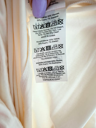 arakii high-waisted wide-leg pants featuring a soft draped fold-over waistband and a relaxed, flowing silhouette, S