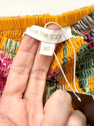 Love the label yellow floral mini skirt, xs