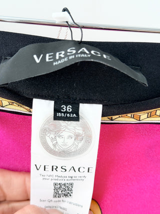 Versace vibrant leggings with ornate baroque motifs, and a fitted stretch silhouette, 36