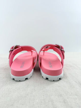 Prada EVA rubber buckled sandals featuring adjustable side buckle straps, molded rubber footbed, and chunky tread sole, 9.5