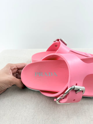 Prada EVA rubber buckled sandals featuring adjustable side buckle straps, molded rubber footbed, and chunky tread sole, 9.5