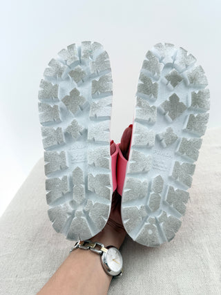 Prada EVA rubber buckled sandals featuring adjustable side buckle straps, molded rubber footbed, and chunky tread sole, 9.5