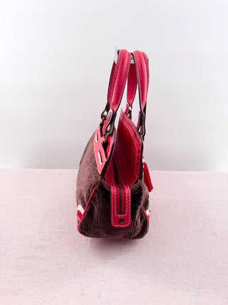 Carolina Herrera vintage leather and velvet tassel top handle bag